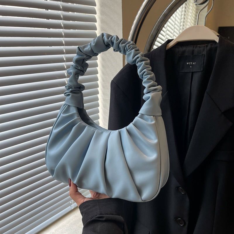 Borsa a spalla da donna con design moderno plissettato