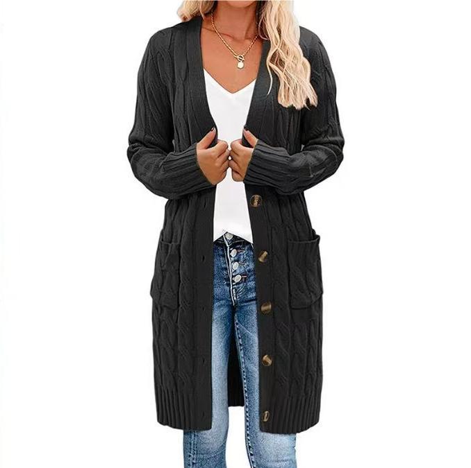 Damkofta med lång ärm, knäppning och fickor