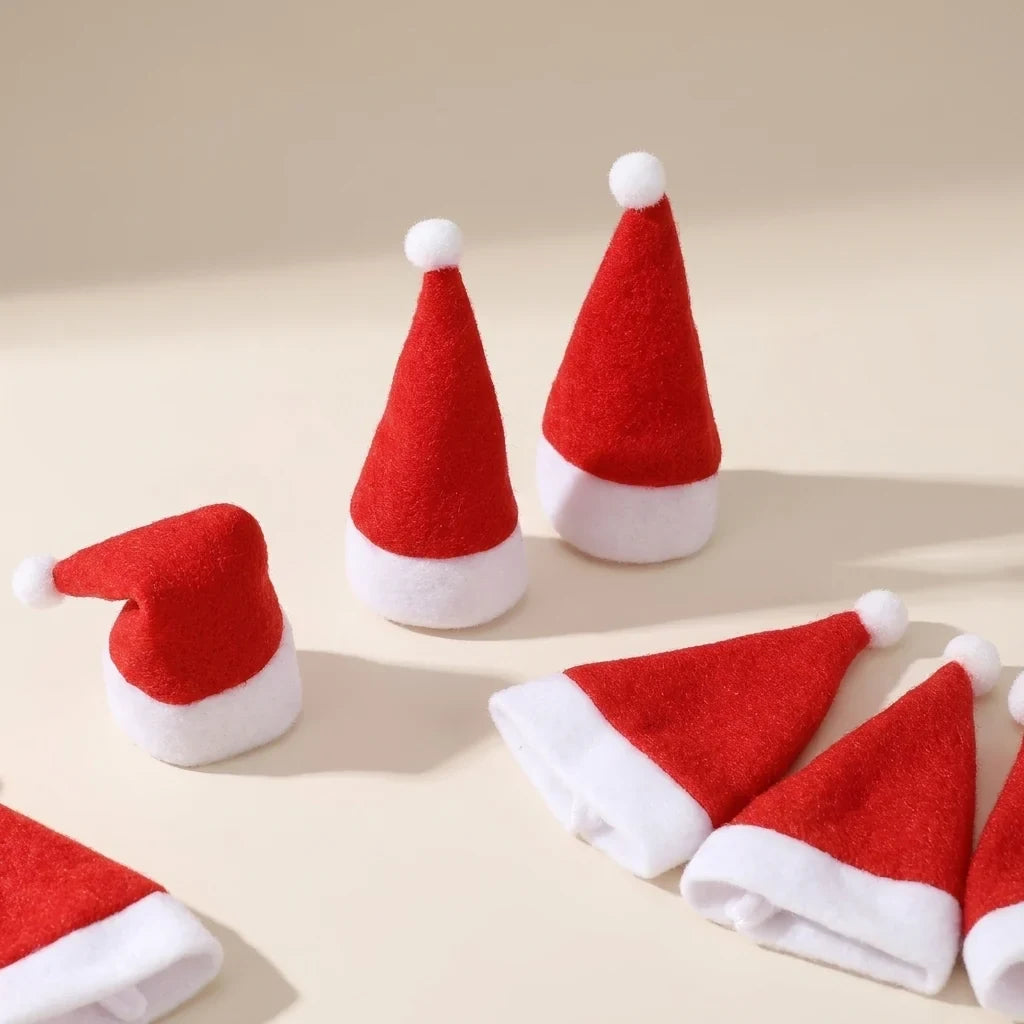 Christmas Table Decorations with Santa Hat Cutlery Holders and Bottle Toppers Set of 12 cm - Image 1