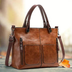 Borsa con chiusura a zip strutturata e tracolla