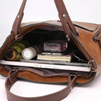 Borsa con chiusura a zip strutturata e tracolla