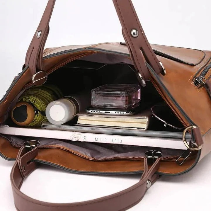 Borsa con chiusura a zip strutturata e tracolla