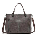 Borsa con chiusura a zip strutturata e tracolla