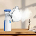 Kids' Portable Nebulizer Machine with Battery Power Face Mask and Fine Mist for Asthma - Image 1