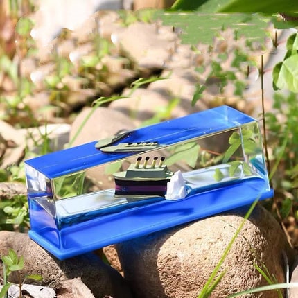 Liquid Wave Paperweight with LED Light Base and Floating Ship - Image 14