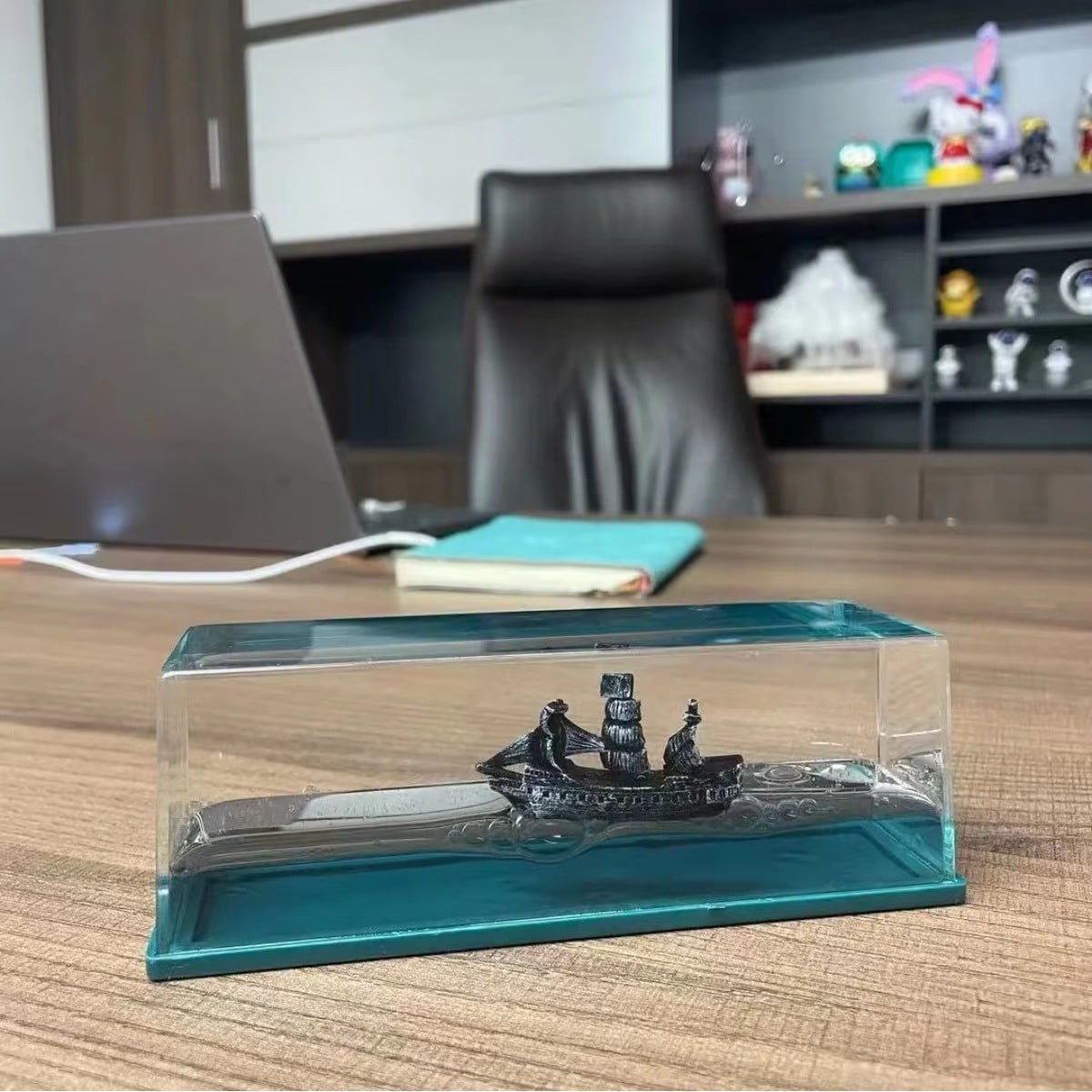 Liquid Wave Paperweight with LED Light Base and Floating Ship - Image 2