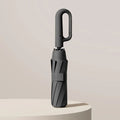 Men's Repel Windproof Travel Umbrella with Compact Folding Design and UV Blocker - Image 1