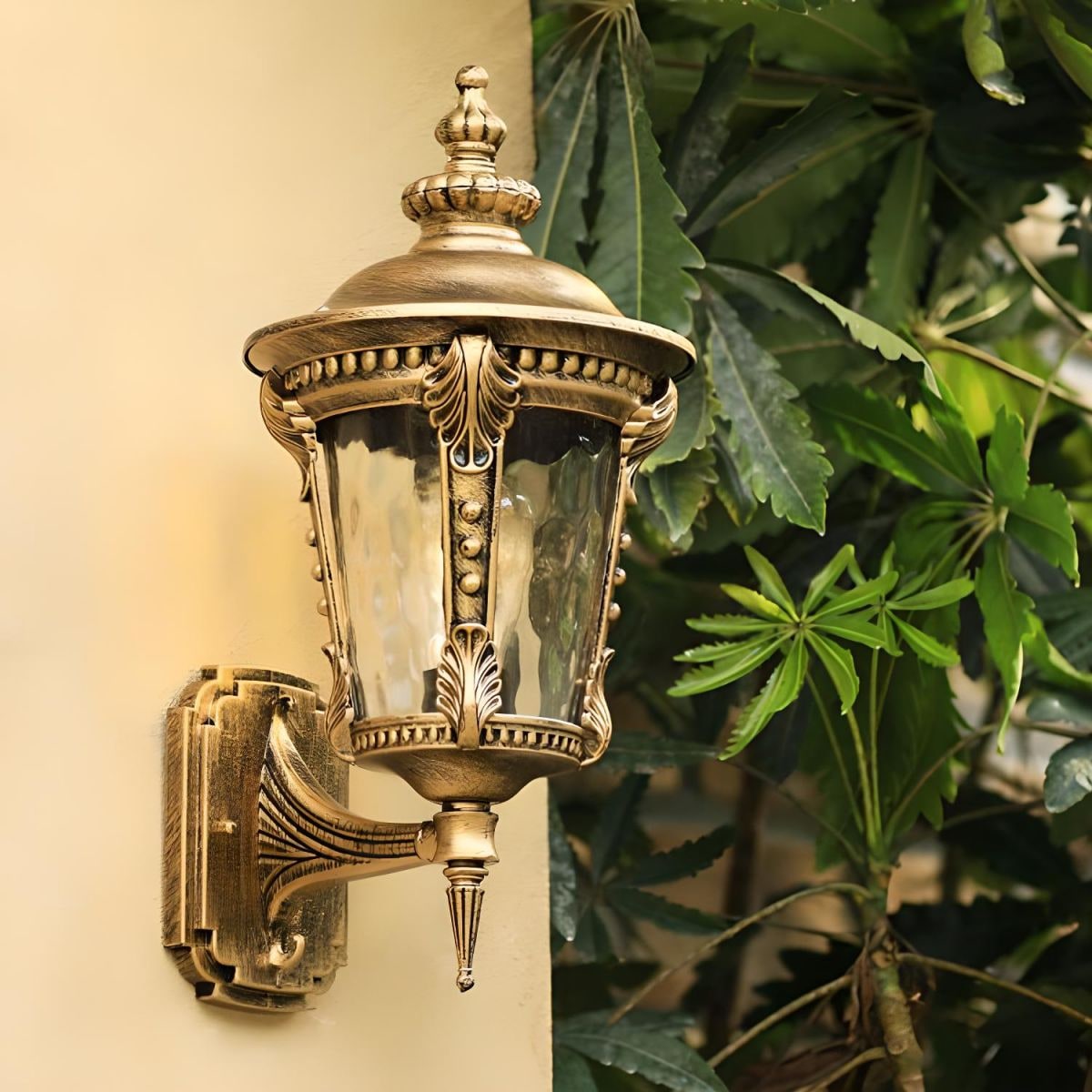 Outdoor Wall Lantern with Vintage Glass Shade and Ornate Scrollwork Design - Image 1