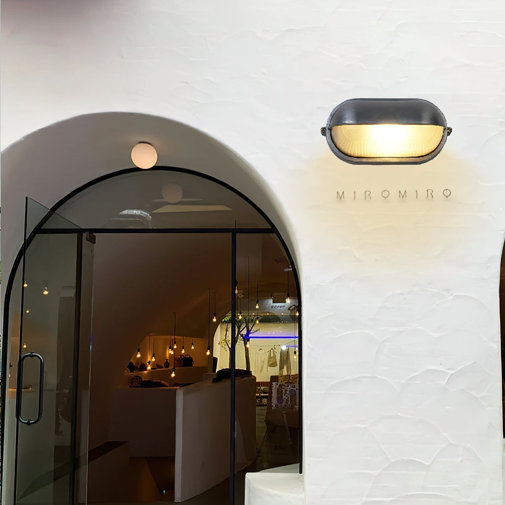Outdoor Wall Light with Bulkhead Design Oval Eyelid Cover and Industrial Nautical Style - Image 4