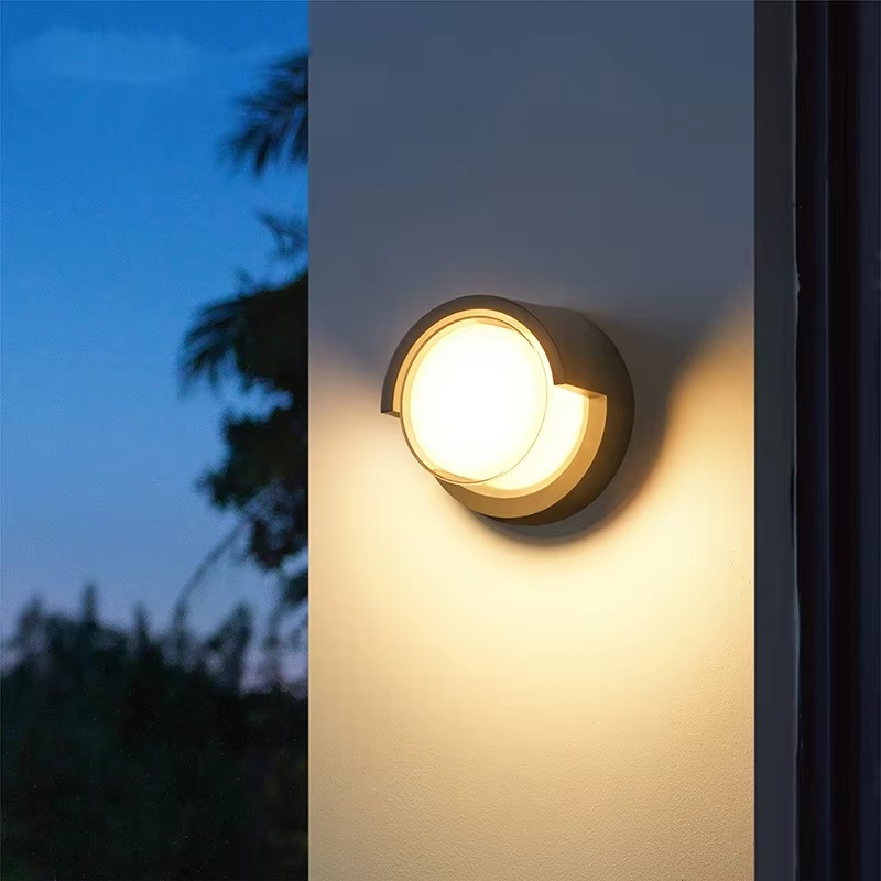 Outdoor Wall Sconce with Motion Sensor LED and Weather-Resistant Geometric Design - Image 3