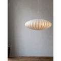Saucer Pendant Light with Ribbed Silk Shade and Mid Century Modern Design - Image 1