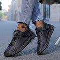 Women's Slip on Sneakers Walking Shoes with Padded Collar and Faux Leather Upper - Image 1